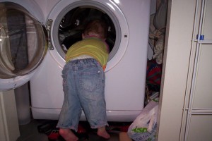 Mummy, let me put on the washing machine – on my own! Mummy, let me put on the washing machine – on my own!