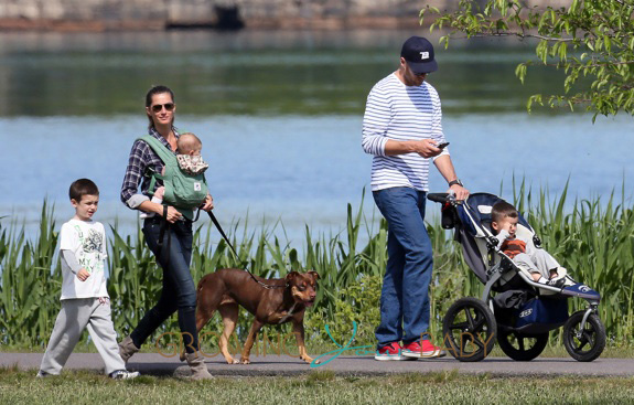 Gisele Bundchen, Tom Brady, family and dog all steal kisses in the park